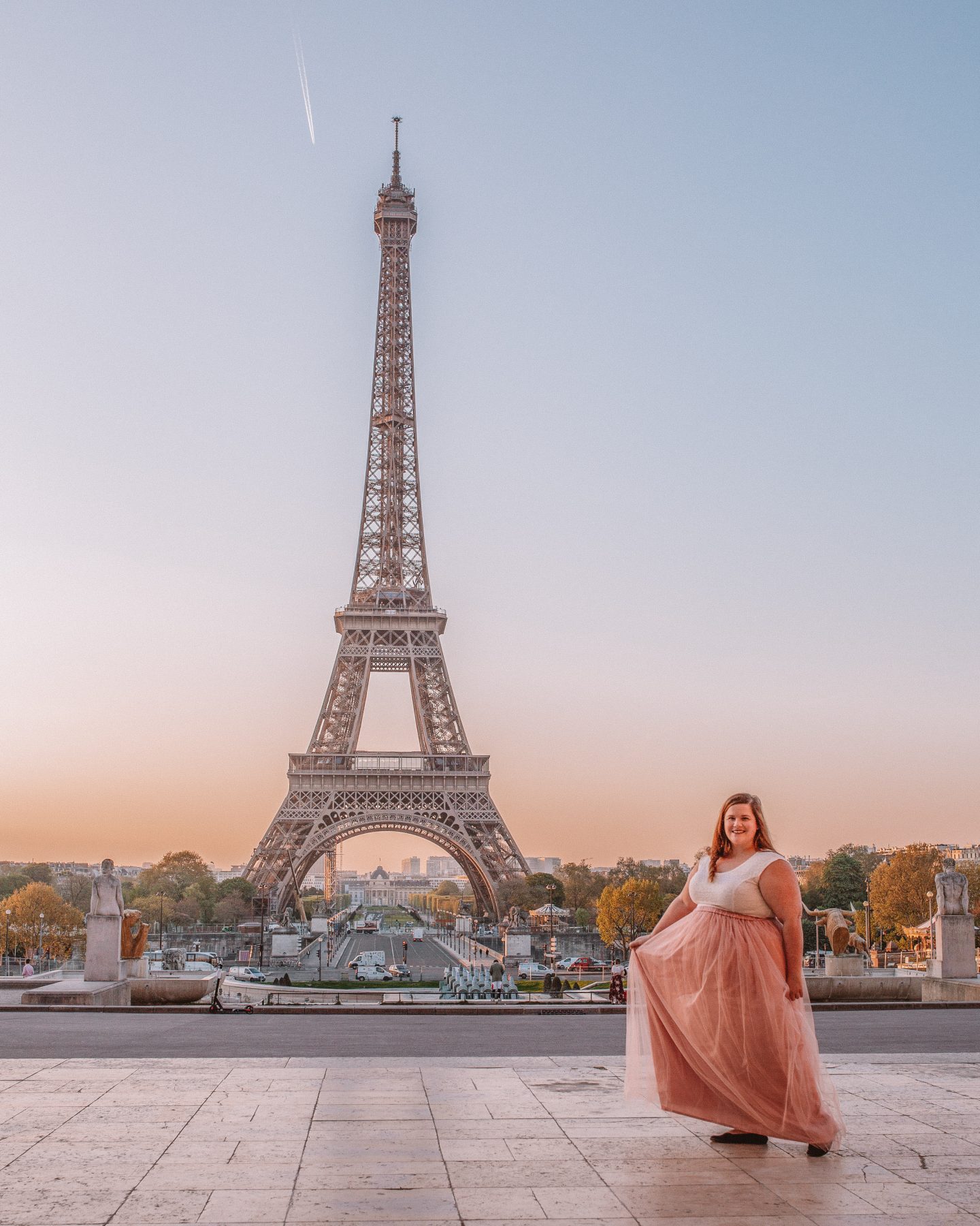 How to get incredible photos of yourself while traveling in Paris, France at the Eiffel Tower.