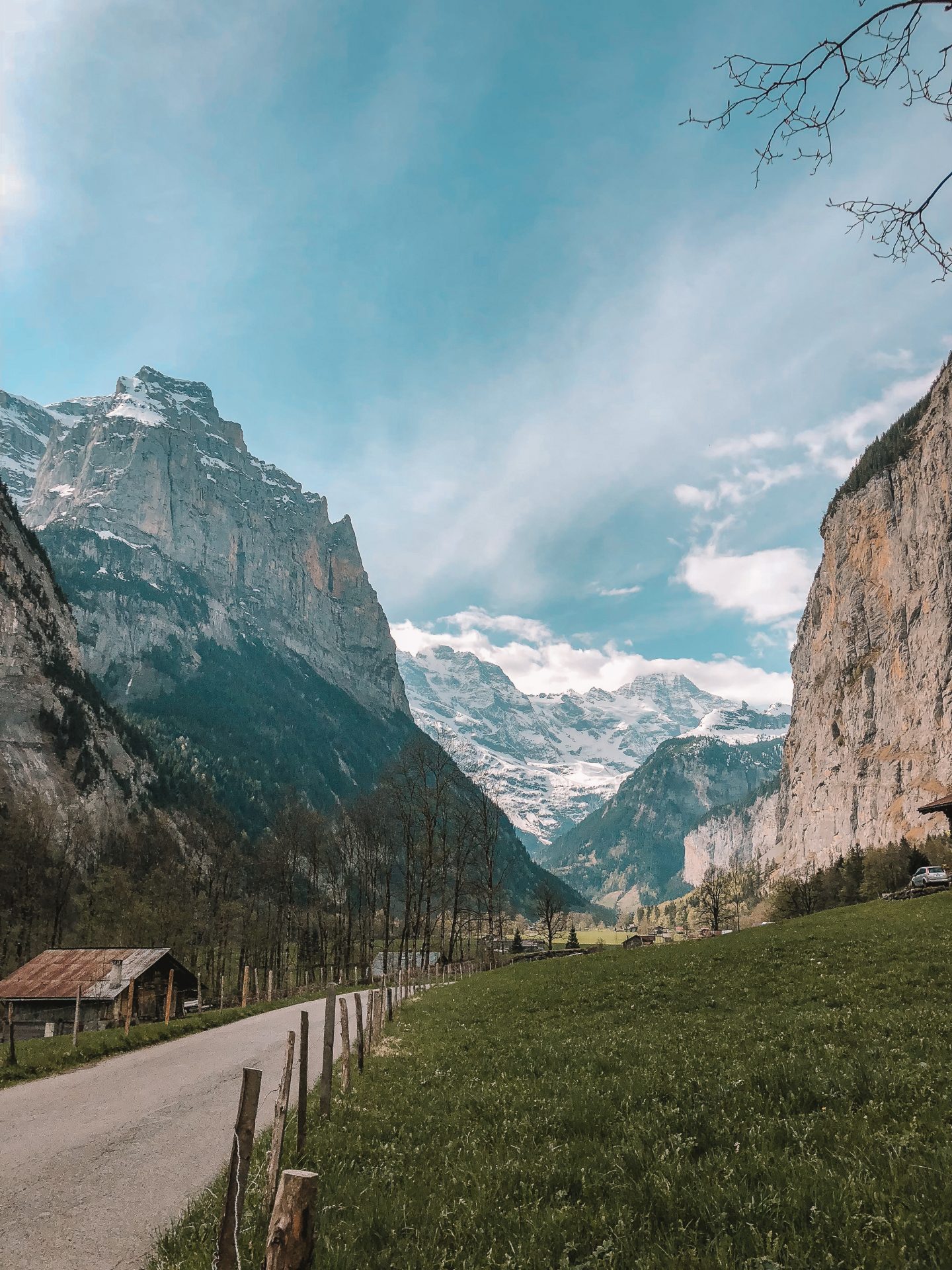 A roadway to the Swiss Alps in the valley of Lauterbrunnen, Switzerland.