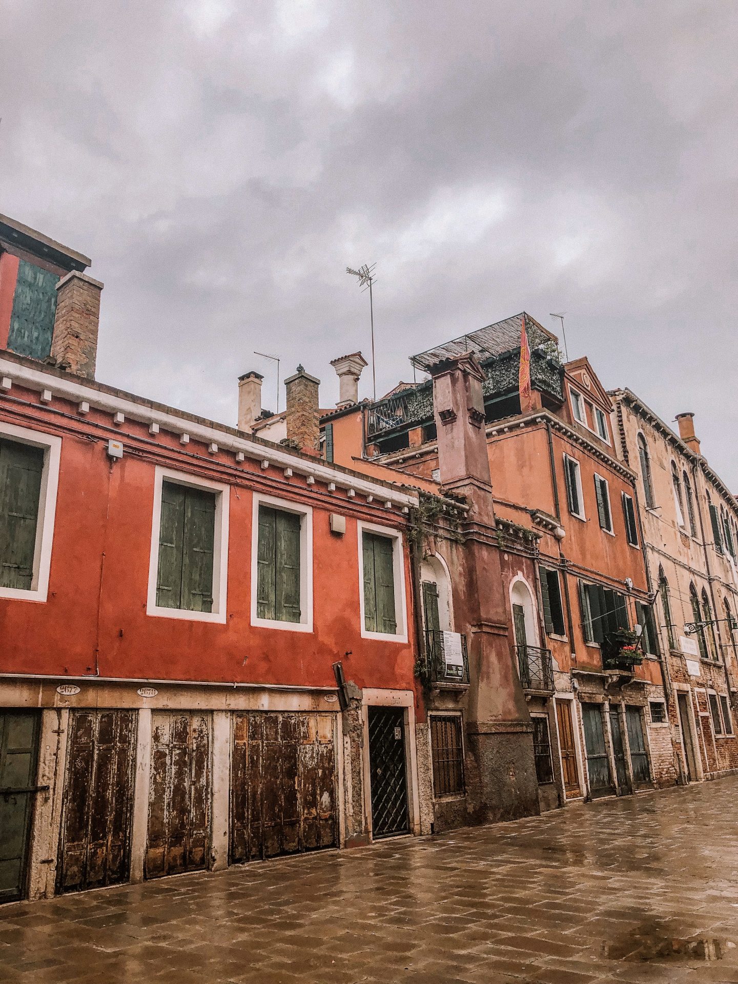Buildings on a recently wet street in Venice, Italy