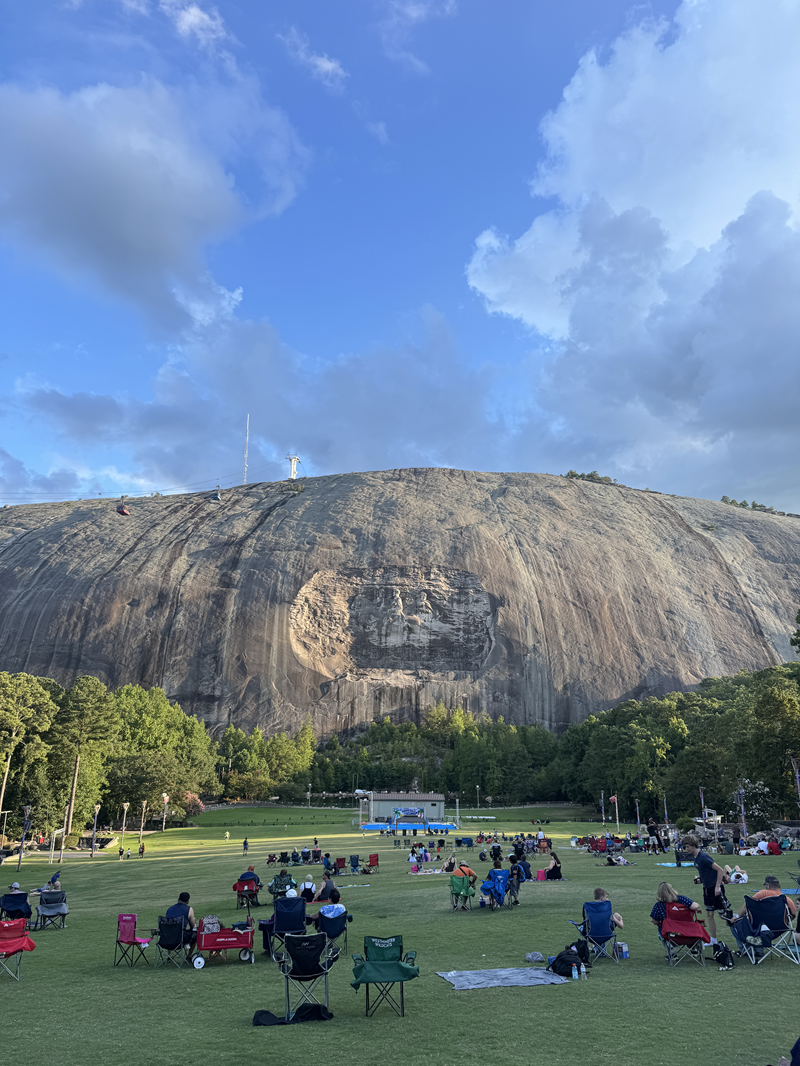 Stone Mountain Carving and Lawn full of chairs waiting for evening laser show. Weekend Getaway to Stone Mountain