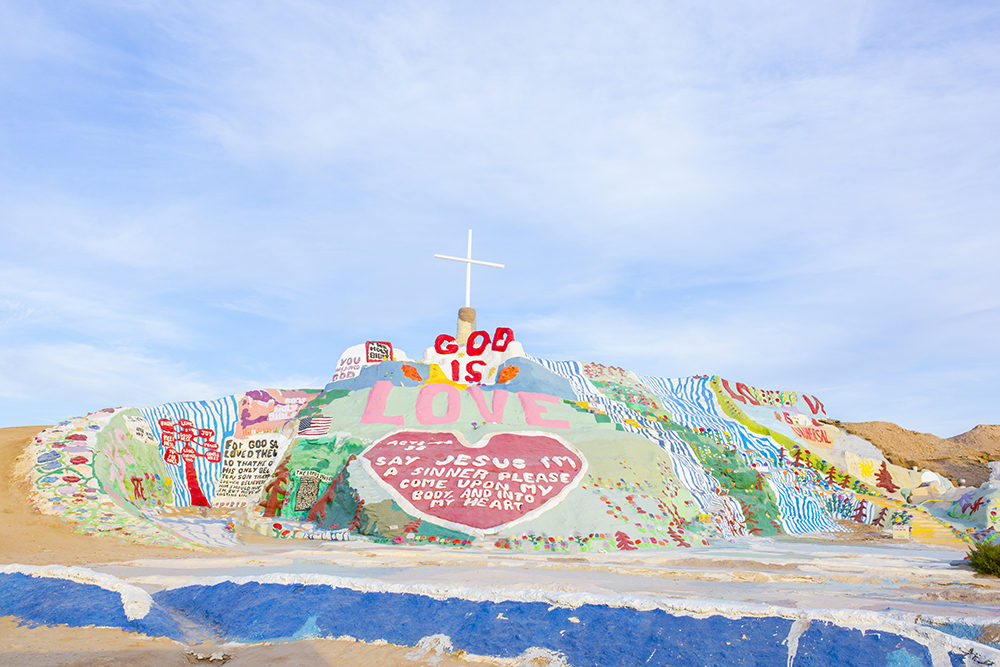 If you want to see a rainbow paradise where the Gen-Zers go for photos, check out this guide for visiting Salvation Mountain in Southern California!